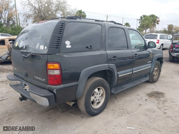 2003 Chevrolet Tahoe LT with VIN 1GNEC13Z93R296379, listed as a IAAI auction lot 41574575 with 301,567 mi miles. Bid and sale history available at carsss.com. Image 4.