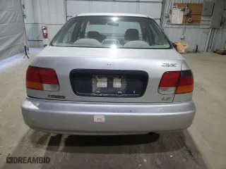 1998 Honda Civic LX with VIN 2HGEJ6675WH554442, listed as a Copart auction lot 53257865 with 104,597 mi miles and Clean Title. Bid and sale history available at carsss.com. Image 6.