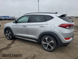 2018 Hyundai Tucson Value with VIN KM8J33A28JU748241, listed as a Copart auction lot 87492464 with 56,457 mi miles and Salvage Title. Bid and sale history available at carsss.com. Image 2.