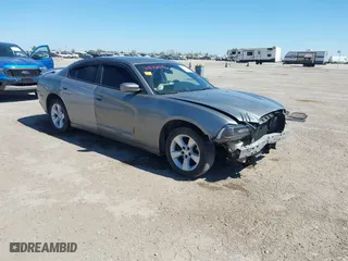 2014 Dodge Charger SE with VIN 2C3CDXBG1EH168709, listed as a IAAI auction lot 41872541 with 137,877 mi miles. Bid and sale history available at carsss.com. Image 1.