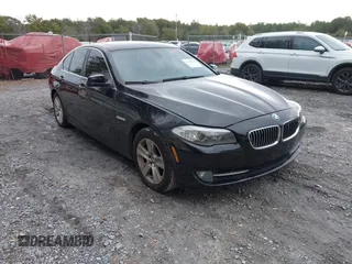 2012 BMW 5 Series 528i with VIN WBAXG5C51CDY28325, listed as a IAAI auction lot 41348221 with 125,039 mi miles. Bid and sale history available at carsss.com. Image 1.