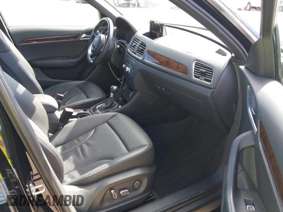 2017 Audi Q3 Premium Plus z VIN WA1HCCFS7HR001054, wystawiony jako IAAI lot #41583344 z przebiegiem 79 330 mil mil oraz . Historia ofert i sprzedaży dostępna na DreamBid. Obrazek 5.