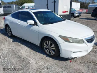 2011 Honda Accord Cpe EX with VIN 1HGCS1B76BA011235, listed as a IAAI auction lot 41581548 with 221,151 mi miles. Bid and sale history available at carsss.com. Image 1.
