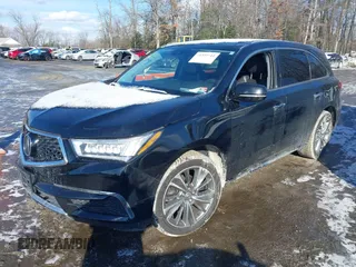 2017 Acura MDX w/Technology Pkg with VIN 5FRYD4H57HB006808, listed as a IAAI auction lot 41350211 with 164,719 mi miles. Bid and sale history available at carsss.com. Image 2.