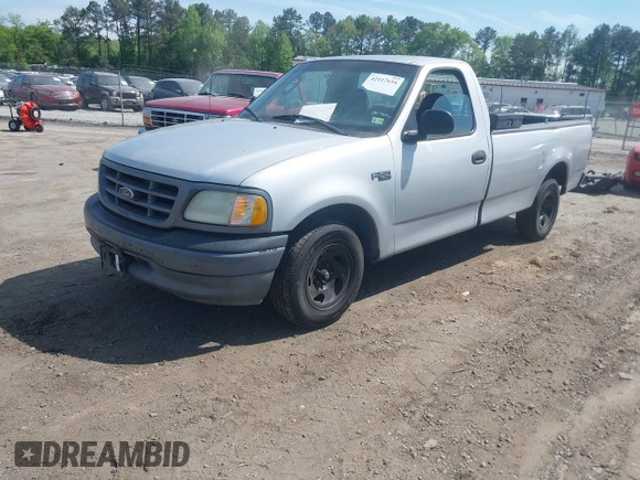 2002 Ford F-150 XL with VIN 1FTRF17202NB42616, listed as a IAAI auction lot 42117616 with 230,852 mi miles. Bid and sale history available at carsss.com. Image 2.