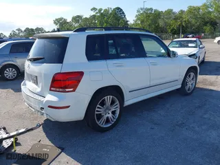 2015 Mercedes-Benz GLK-Class GLK 350 with VIN WDCGG5HB6FG338932, listed as a IAAI auction lot 42027674 with 107,182 mi miles. Bid and sale history available at carsss.com. Image 4.