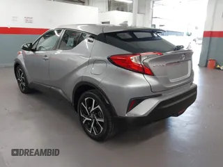 2018 Toyota C-HR XLE z VIN NMTKHMBX0JR015680, wystawiony jako IAAI lot #41987642 z przebiegiem 80 367 mil mil oraz . Historia ofert i sprzedaży dostępna na DreamBid. Obrazek 3.