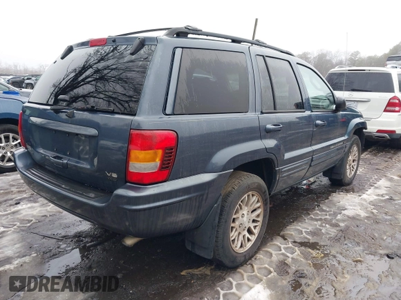 2004 Jeep Grand Cherokee Limited with VIN 1J8GW58J14C139431, listed as a IAAI auction lot 41519523 with 130,398 mi miles and . Bid and sale history available at DreamBid. Image 4.
