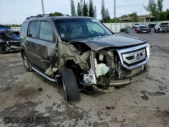 2010 Honda Pilot Touring with VIN 5FNYF3H81AB016255, listed as a Copart auction lot 71052644 with 96,847 mi miles and Salvage Title. Bid and sale history available at DreamBid. Image 11.