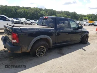 2015 Ram 1500 Rebel z VIN 1C6RR7YT4FS751370, wystawiony jako Copart lot #61675064 z przebiegiem 90 245 mil mil oraz Szkoda całkowita • Salvage title. Historia ofert i sprzedaży dostępna na DreamBid. Obrazek 3.