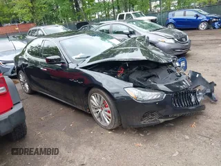 2015 Maserati Ghibli S Q4 z VIN ZAM57RTA3F1145302, wystawiony jako IAAI lot #42218603 z przebiegiem 97 000 mil mil oraz . Historia ofert i sprzedaży dostępna na DreamBid. Obrazek 1.