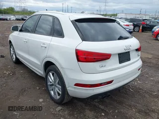 2017 Audi Q3 Premium with VIN WA1ECCFS7HR014647, listed as a IAAI auction lot 42023588 with 211,948 mi miles. Bid and sale history available at carsss.com. Image 3.