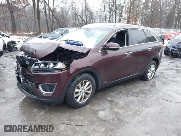 2016 Kia Sorento LX with VIN 5XYPGDA32GG128755, listed as a IAAI auction lot 41025327 with 166,424 mi miles. Bid and sale history available at carsss.com. Image 2.