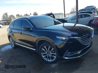 2019 Mazda CX-9 Grand Touring with VIN JM3TCADY4K0326730, listed as a IAAI auction lot 41745638 with 107,137 mi miles. Bid and sale history available at carsss.com. Image 1.
