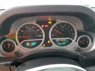2009 Jeep Wrangler Sahara with VIN 1J4FA54109L702963, listed as a Copart auction lot 89211555 with 125,138 mi miles and Clean title. Bid and sale history available at DreamBid. Image 9.