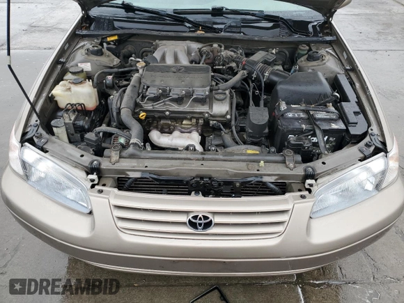 1999 Toyota Camry LE z VIN 4T1BF28K6XU077804, wystawiony jako Copart lot #51485495 z przebiegiem 124 273 mil mil oraz Szkoda całkowita • Salvage title. Historia ofert i sprzedaży dostępna na DreamBid. Obrazek 11.
