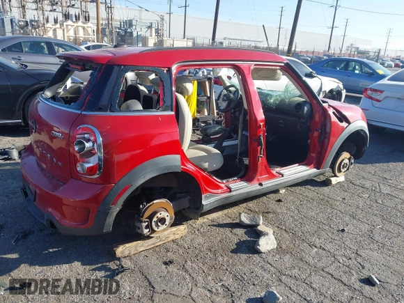 2014 MINI Countryman S with VIN WMWZC3C54EWP26355, listed as a IAAI auction lot 41654476 with Not Provided miles and . Bid and sale history available at DreamBid. Image 4.
