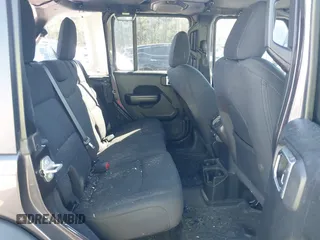 2020 Jeep Wrangler Unlimited Sport S with VIN 1C4HJXDG1LW237405, listed as a IAAI auction lot 40631451 with 60,256 mi miles and . Bid and sale history available at DreamBid. Image 8.