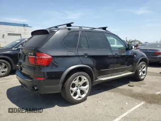 2012 BMW X5 35i z VIN 5UXZV4C51CL744313, wystawiony jako Copart lot #58270755 z przebiegiem 97 903 mil mil oraz Szkoda całkowita • Salvage title. Historia ofert i sprzedaży dostępna na DreamBid. Obrazek 3.