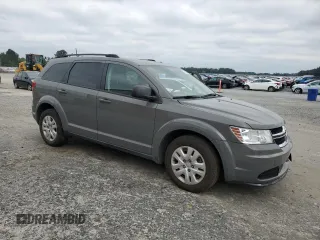 2019 Dodge Journey SE Value with VIN 3C4PDCAB1KT864386, listed as a Copart auction lot 70020424 with 70,551 mi miles and Salvage Title. Bid and sale history available at DreamBid. Image 4.