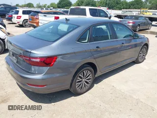 2021 Volkswagen Jetta S z VIN 3VWC57BU0MM098146, wystawiony jako IAAI lot #42201070 z przebiegiem 47 792 mil mil oraz . Historia ofert i sprzedaży dostępna na DreamBid. Obrazek 4.