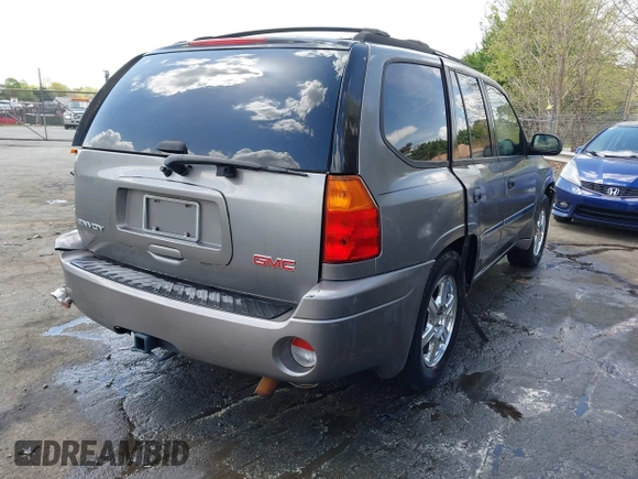 2008 GMC Envoy SLE2 with VIN 1GKDS13S782160430, listed as a IAAI auction lot 41951811 with 156,627 mi miles. Bid and sale history available at carsss.com. Image 4.