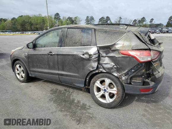2015 Ford Escape SE with VIN 1FMCU9GXXFUC72335, listed as a Copart auction lot 51114735 with 157,471 mi miles and Salvage Title. Bid and sale history available at DreamBid. Image 2.