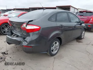 2018 Ford Fiesta SE with VIN 3FADP4BJXJM136232, listed as a IAAI auction lot 41901540 with 119,065 mi miles and . Bid and sale history available at DreamBid. Image 4.