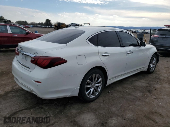 2015 Infiniti Q70 with VIN JN1BY1AR0FM561260, listed as a Copart auction lot 46496955 with 69,792 mi miles and Salvage title. Bid and sale history available at DreamBid. Image 3.