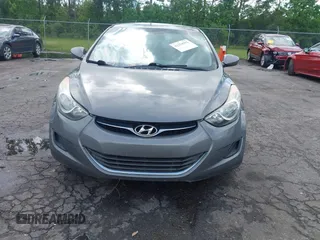 2013 Hyundai Elantra GLS z VIN 5NPDH4AE5DH416470, wystawiony jako IAAI lot #42254952 z przebiegiem 127 059 mil mil oraz . Historia ofert i sprzedaży dostępna na DreamBid. Obrazek 6.