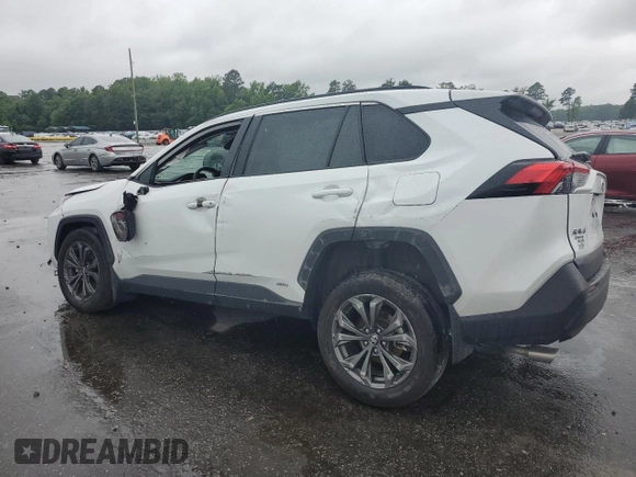2024 Toyota RAV4 Hybrid XLE Premium with VIN 2T3B6RFV8RW074600, listed as a Copart auction lot 59560115 with 23,839 mi miles and Salvage title. Bid and sale history available at DreamBid. Image 2.