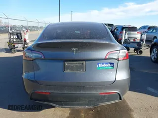 2023 Tesla Model Y Long Range with VIN 7SAYGAEEXPF714760, listed as a IAAI auction lot 41748398 with 49,802 mi miles and . Bid and sale history available at DreamBid. Image 17.