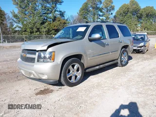 2014 Chevrolet Tahoe LTZ z VIN 1GNSCCE05ER223171, wystawiony jako IAAI lot #41329685 z przebiegiem 150 328 mil mil oraz . Historia ofert i sprzedaży dostępna na DreamBid. Obrazek 2.