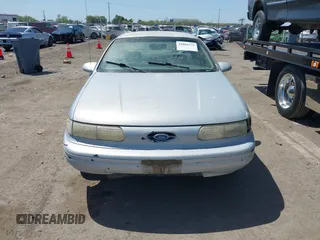 1994 Ford Taurus GL z VIN 1FALP5242RG144553, wystawiony jako IAAI lot #42084759 z przebiegiem 45 059 mil mil oraz . Historia ofert i sprzedaży dostępna na DreamBid. Obrazek 6.