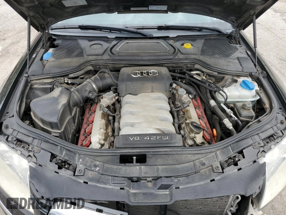 2007 Audi A8 4.2L z VIN WAUMV44E17N007856, wystawiony jako Copart lot #58255675 z przebiegiem 125 804 mil mil oraz Szkoda całkowita • Salvage title. Historia ofert i sprzedaży dostępna na DreamBid. Obrazek 11.