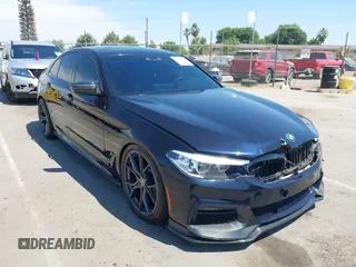 2019 BMW 5 Series 540i z VIN WBAJE5C5XKWW14562, wystawiony jako IAAI lot #42662346 z przebiegiem 89 931 mil mil oraz . Historia ofert i sprzedaży dostępna na DreamBid. Obrazek 1.