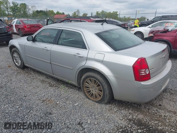 2008 Chrysler 300 Touring with VIN 2C3KA53G48H309834, listed as a IAAI auction lot 42200833 with 209,198 mi miles. Bid and sale history available at carsss.com. Image 3.
