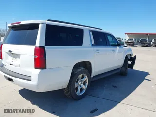 2016 Chevrolet Suburban LT with VIN 1GNSKHKC7GR172516, listed as a IAAI auction lot 41680550 with 237,270 mi miles. Bid and sale history available at carsss.com. Image 4.