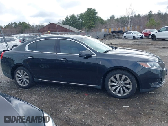 2014 Lincoln MKS with VIN 1LNHL9EK0EG601444, listed as a IAAI auction lot 41849160 with 164,791 mi miles. Bid and sale history available at carsss.com. Image 13.