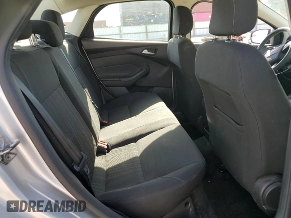 2018 Ford Focus SE z VIN 1FADP3F29JL206110, wystawiony jako Copart lot #53953515 z przebiegiem 80 841 mil mil oraz Szkoda całkowita • Salvage title. Historia ofert i sprzedaży dostępna na DreamBid. Obrazek 10.