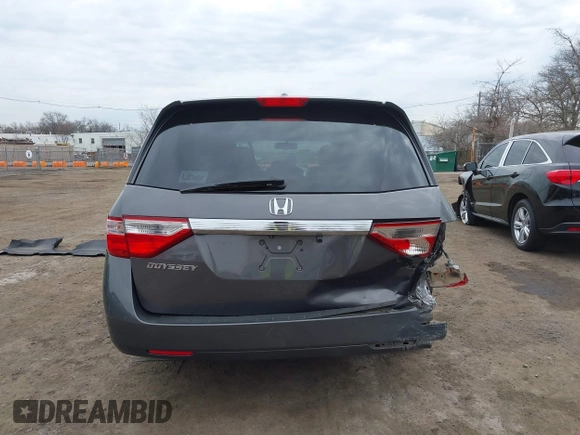 2012 Honda Odyssey EX-L with VIN 5FNRL5H65CB042898, listed as a IAAI auction lot 41784075 with 179,596 mi miles and . Bid and sale history available at carsss.com. Image 16.