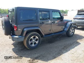 2016 Jeep Wrangler Unlimited Sahara with VIN 1C4BJWEG7GL340074, listed as a IAAI auction lot 42434763 with 81,095 mi miles and . Bid and sale history available at DreamBid. Image 4.