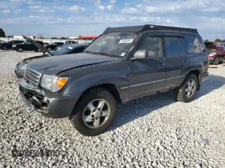 2003 Toyota Land Cruiser with VIN JTEHT05J932044630, listed as a Copart auction lot 76836364 with 215,802 mi miles and Salvage Title. Bid and sale history available at carsss.com. Image 1.