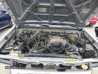 2000 Nissan Frontier XE with VIN 1N6ED27T2YC425703, listed as a IAAI auction lot 42687301 with 186,317 mi miles and . Bid and sale history available at DreamBid. Image 10.