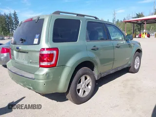 2008 Ford Escape Hybrid z VIN 1FMCU59H48KA68336, wystawiony jako IAAI lot #42083411 z przebiegiem 311 958 mil mil oraz . Historia ofert i sprzedaży dostępna na DreamBid. Obrazek 4.