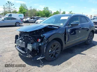 2024 Mazda CX-30 S Select Sport with VIN 3MVDMBBM2RM657781, listed as a IAAI auction lot 42297311 with 13,677 mi miles and . Bid and sale history available at DreamBid. Image 2.