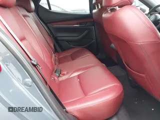 2020 Mazda 3 Premium z VIN JM1BPBNM9L1174949, wystawiony jako IAAI lot #41728868 z przebiegiem 68 968 mil mil oraz . Historia ofert i sprzedaży dostępna na DreamBid. Obrazek 8.