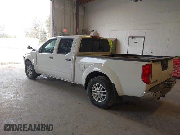 2018 Nissan Frontier SV z VIN 1N6DD0FV7JN718221, wystawiony jako IAAI lot #42118492 z przebiegiem 132 413 mil mil oraz . Historia ofert i sprzedaży dostępna na DreamBid. Obrazek 3.