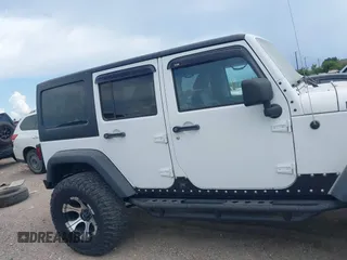 2011 Jeep Wrangler Unlimited Rubicon with VIN 1J4BA6H10BL536027, listed as a IAAI auction lot 42567901 with 164,487 mi miles and . Bid and sale history available at DreamBid. Image 13.