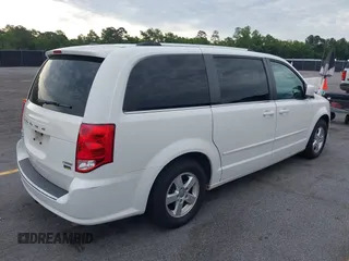 2011 Dodge Grand Caravan Crew with VIN 2D4RN5DG1BR725938, listed as a IAAI auction lot 42213308 with 162,894 mi miles and . Bid and sale history available at DreamBid. Image 4.